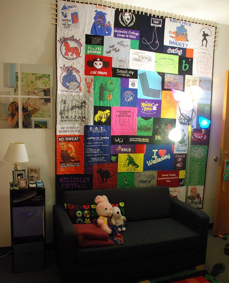 T-shirt quilt by Too Cool T-shirt Quilts hanging on a wall