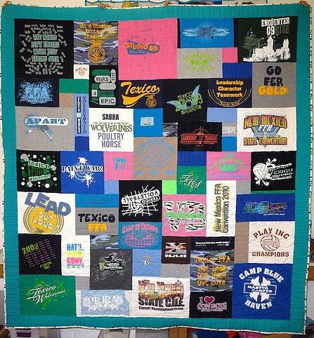 A T-shirt quilt with an upside down block. 