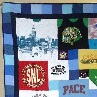 T-shirt quilt with a 4" pieced +2" solid border