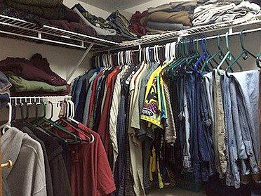 sorting the clothing of a deceased loved one