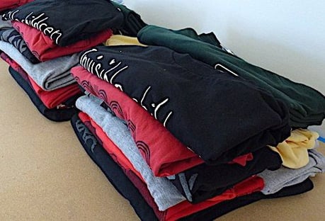 We collected 2 stacks of identical T-shirts to compare how Campus Quilts and Too Cool T-shirt Quilts do with the very same shirts.