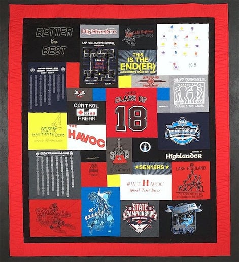 Graduation T-shirt quilt with a black and red border.
