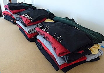 3 stack of identical T-shirts for comparison