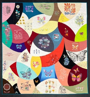 Arching Petals style T-shirt quilt by Too Cool T-shirt Quilts