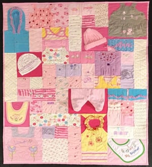 Complex Baby clothes quilt by Too Cool T-shirt Quilts