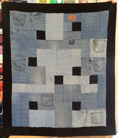 Blue jeans transformed into a quilt. Memorial quilts by Too Cool T-shirt Quilts