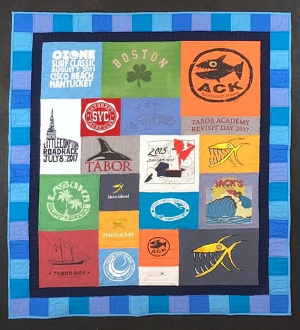 T-shirt quilt with a 4" pieced + 2" solid border