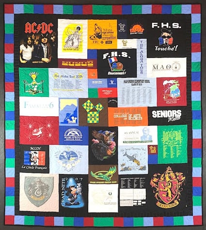 T-shirt quilt with a 4" pieced + 2" solid border