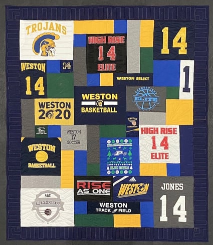 T-shirt quilt with a 4" solid border