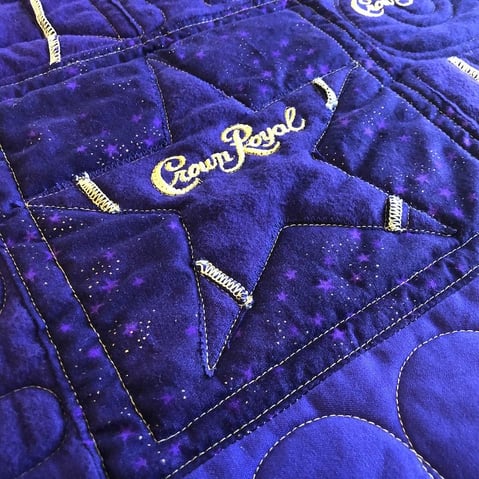 Crown royal quilt close up showing a star block