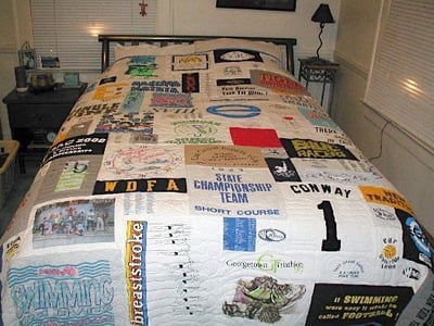 A swimmers T-shirt Quilt on Bed