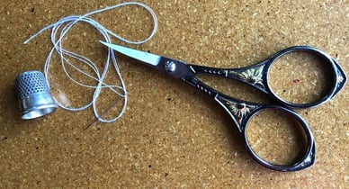 Tools used to fix a T-shirt Quilt