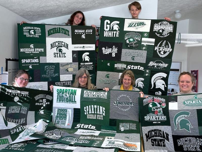 Gang with 8 MSU quilts