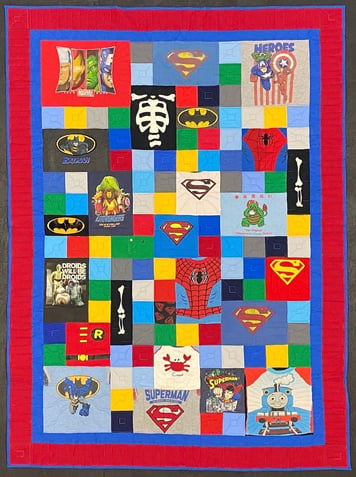 Use blank blocks and a border to make a T-shirt quilt large.