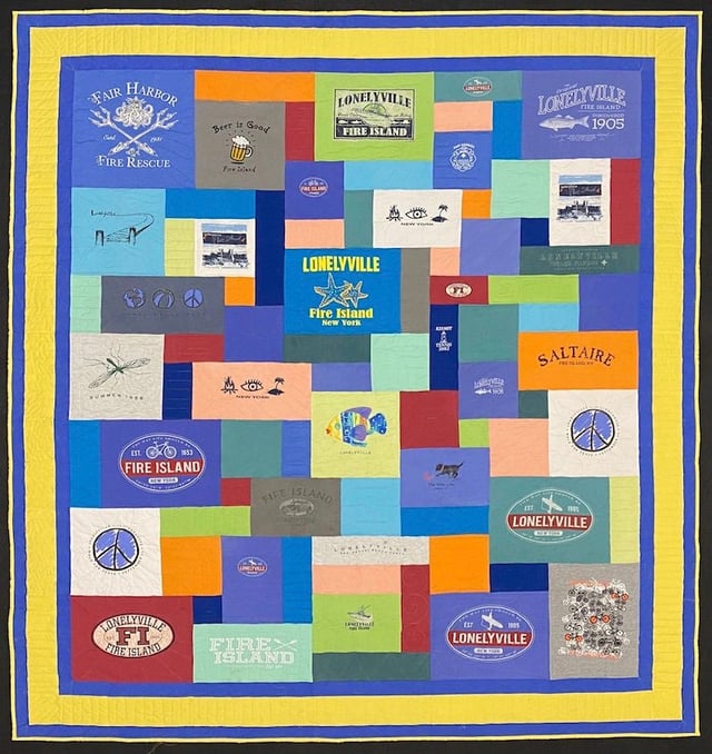 Larger with fillers and triple border T-shirt quilt by Too Cool T-shirt Quilts