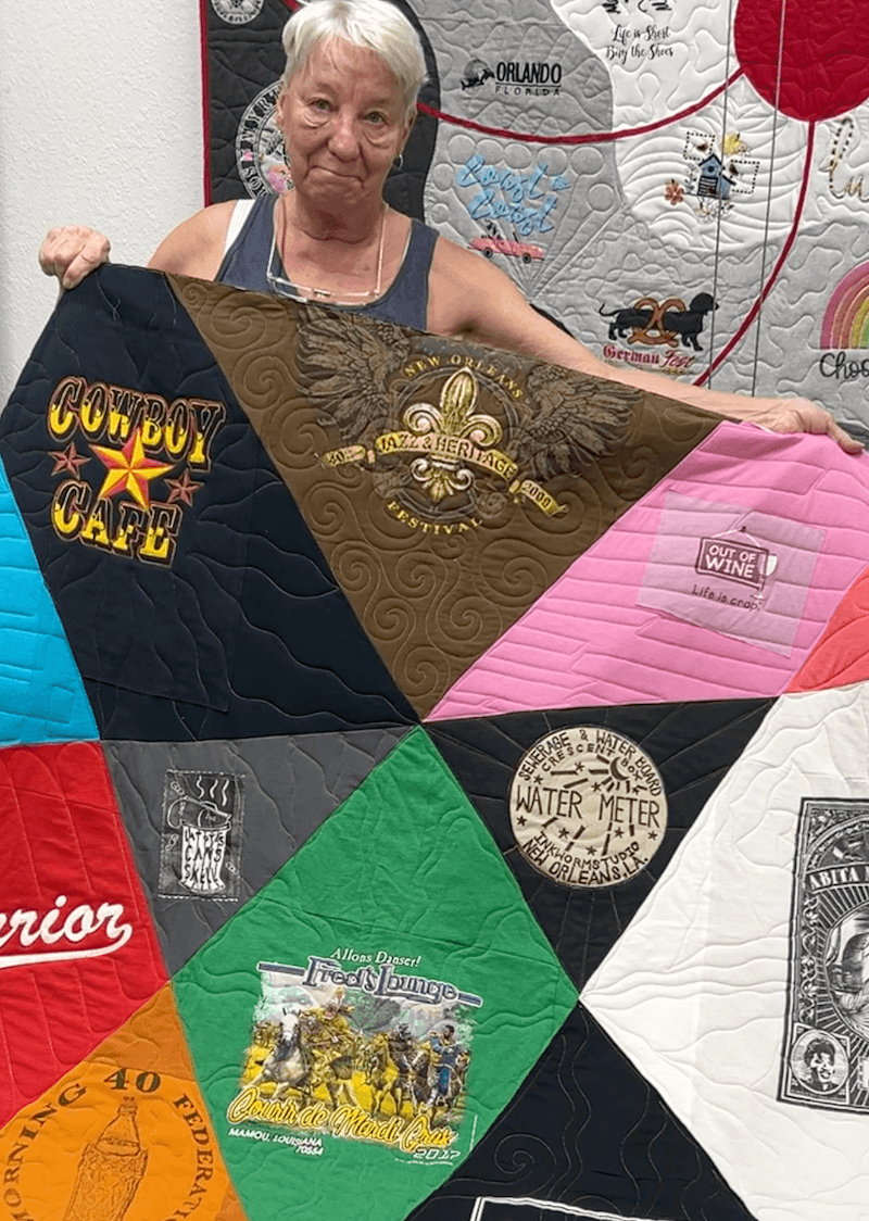 Linda with the Ultra Modern T-shirt Quilt Made with Andrea at Too Cool T-shirt Quilts