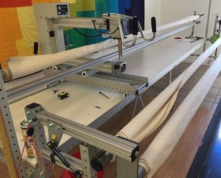 Long arm quilting machine for a T-shirt quilt