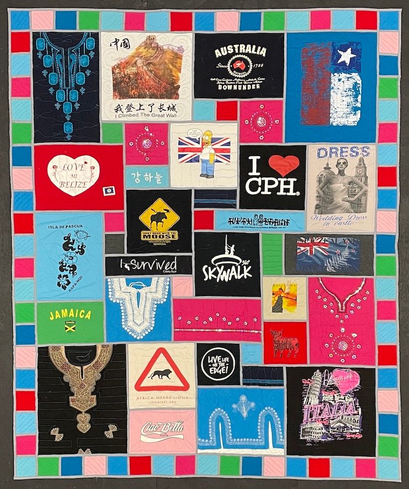 An awesome Stained-glass T-shirt quilt by Too Cool T-shirt Quilts