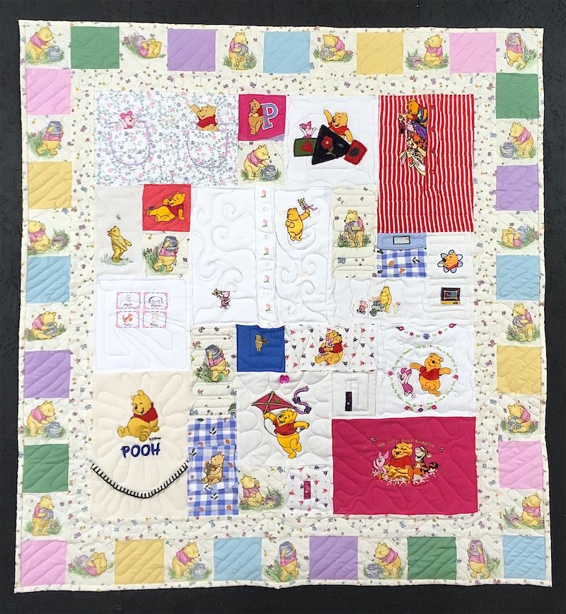 Poor baby clothes quilt made by Too Cool T-shirt Quilts