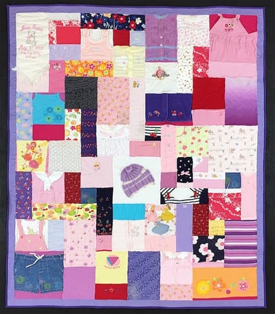 baby clothes quilt by Too Cool T-shirt Quilts