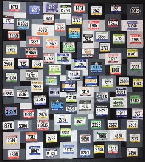This quilt was made just with running race bibs.