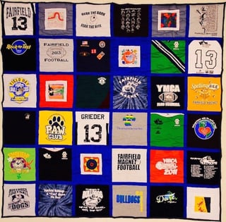 Traditional Style T-shirt quilt with sashing.
