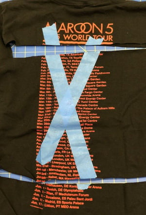 This shows what happens to the X'd out part of your T-shirts. It's cut through and not saved. 