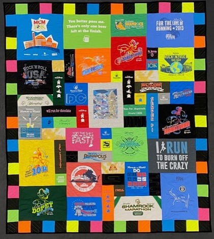 T-shirt quilt with a 4" pieced border