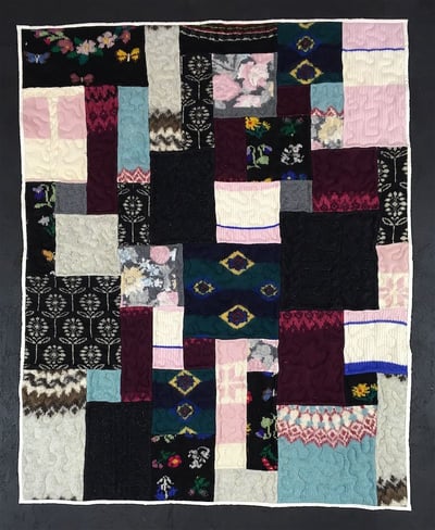 Wool Sweaters made into a quilt.