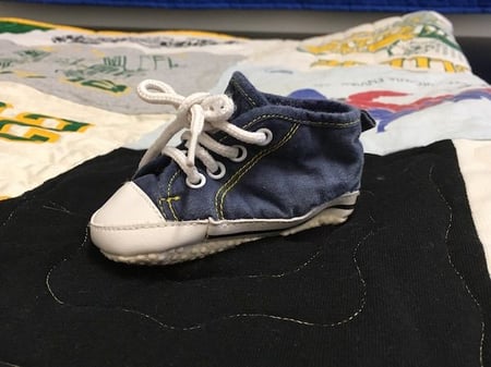 baby shoe used in a baby clothes quilt