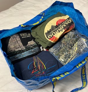 bag of T-shirts - have Too Cool T-shirt Quilts make you a quilt!