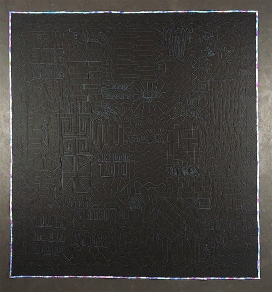 black back of a T-shirt quilt - awesome quilting