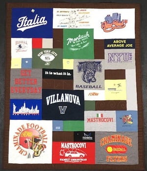 examples of using blank blocks of fabric to add another color to a T-shirt quilt.