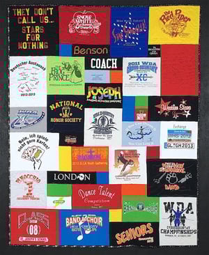 A cool T-shirt quilt - the blocks are balanced. 