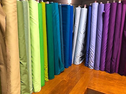 bolts of fabric -cotton has so many color choices