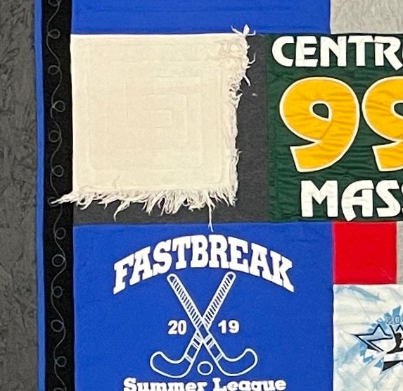 close up of baby blanket in a Graduation T-shirt quilt by Too Cool T-shirt Quilt