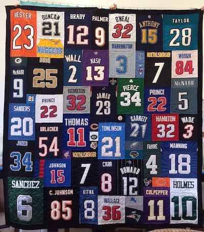so many different numbers on a T-shirt quilt. By Too Cool T-shirt Quilts