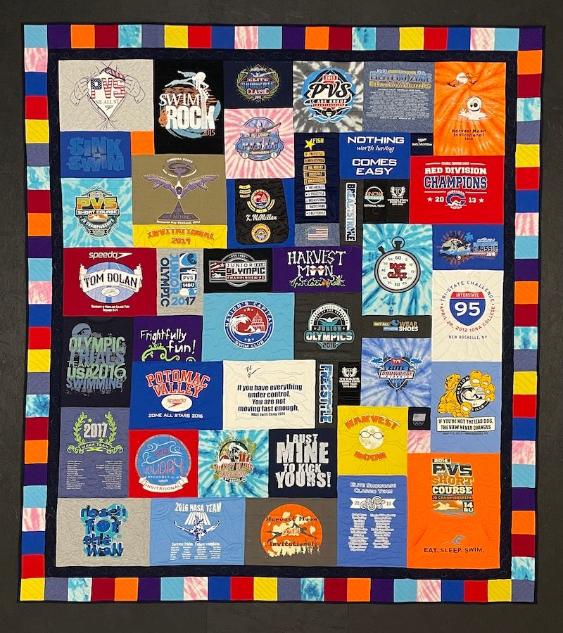 Wonderful T-shirt quilt by Too Cool T-shirt Quilts.