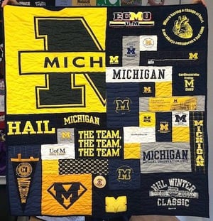 U of M T-shirt quilt with one gigantic block that dominates the quilt.