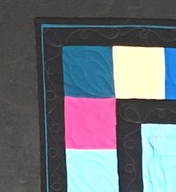 Piping used on a T-shirt quilt