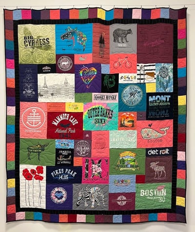 Travel T-shirt quilt - colorful with T-shirts from around the country