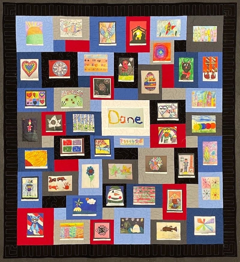 Kids artwork on in a quilt