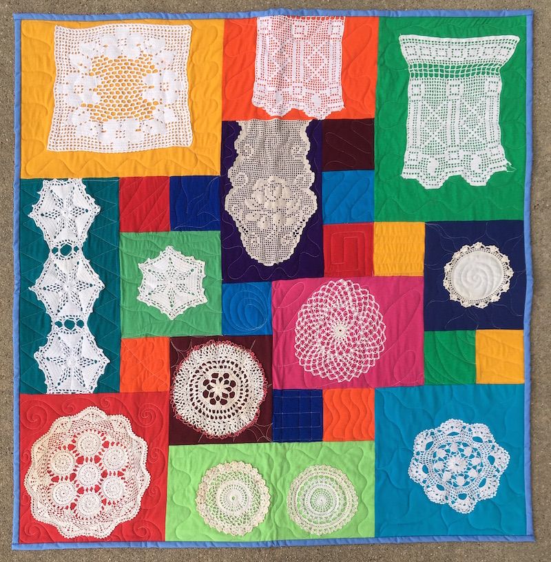 Doilies used to make a quilt.